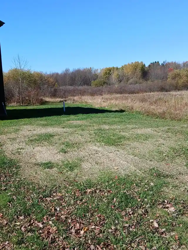 Open field site prepared for excavation work in Dewittville, New York